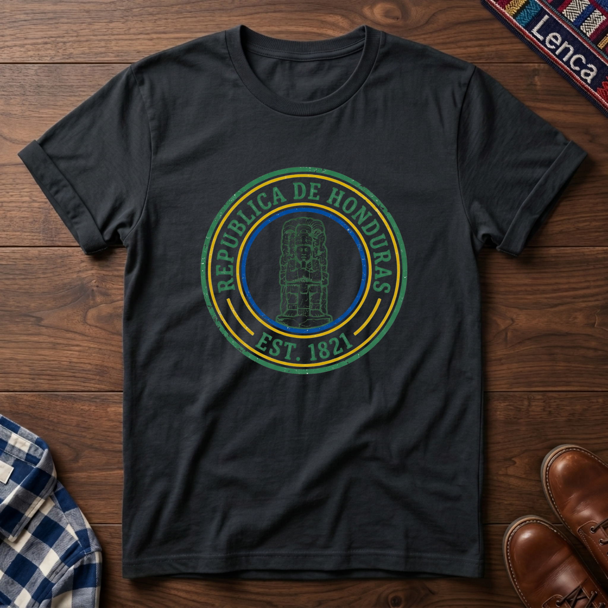 Black t-shirt with 'Republica de Honduras' text graphic design on a wooden surface