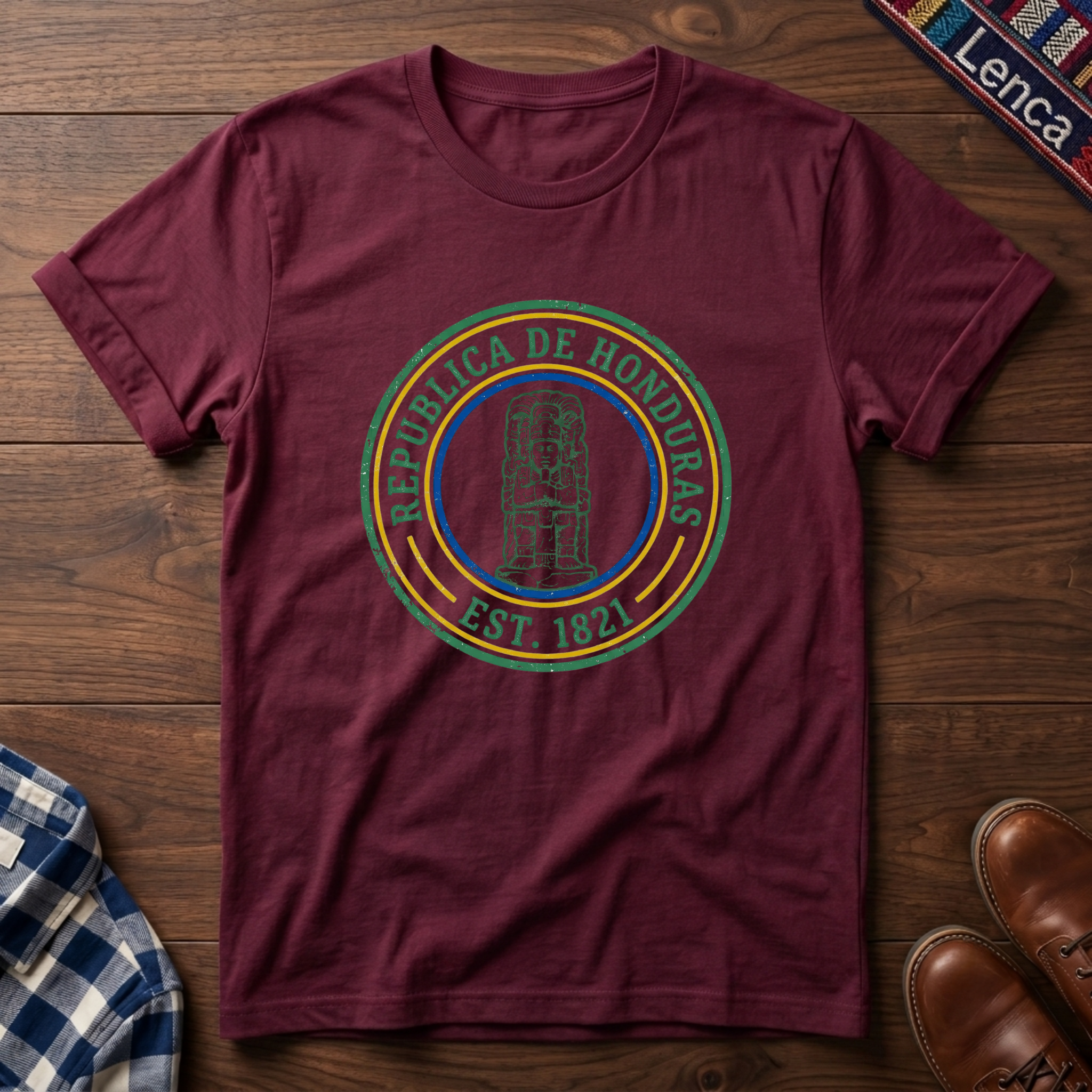 Cardinal Red t-shirt with 'Republica de Honduras' text graphic design on a wooden surface