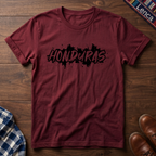 Cherry red t-shirt with 'Honduras' print on a wooden surface