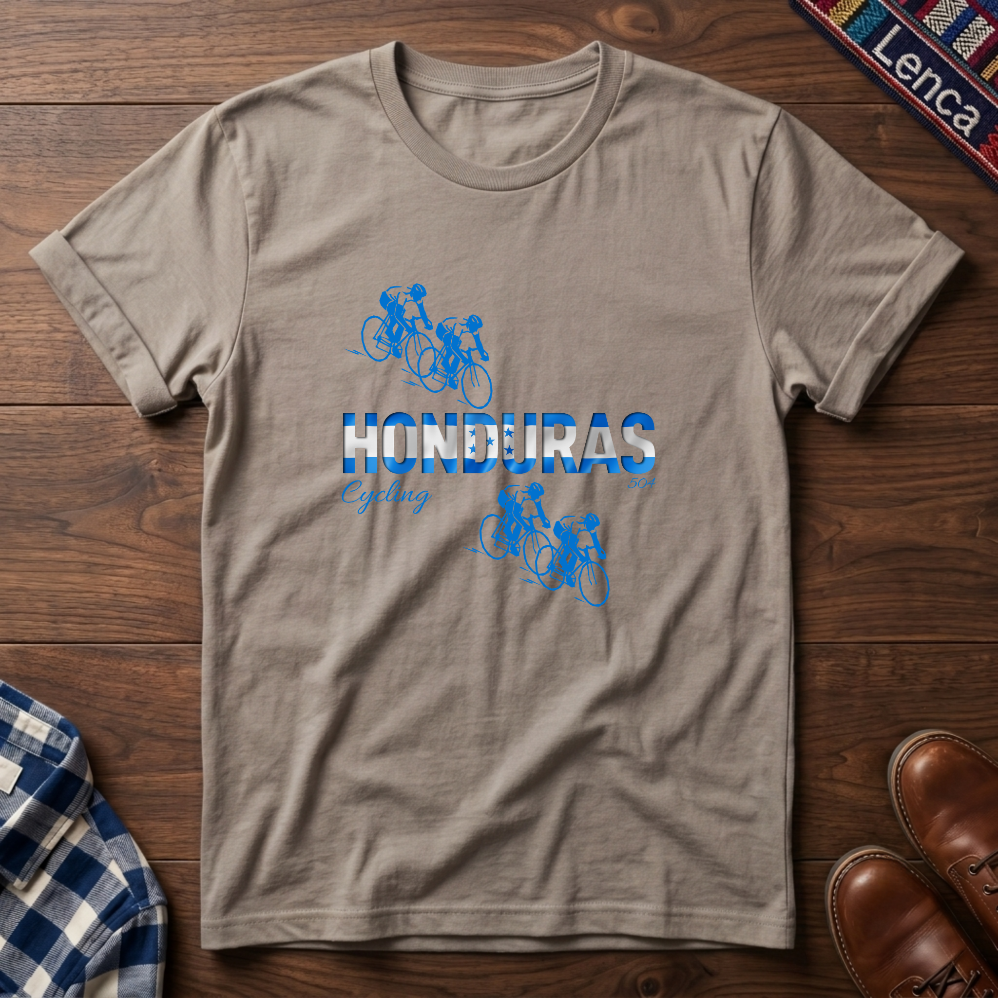 Sand t-shirt with 'Honduras Cycling' design on a white background
