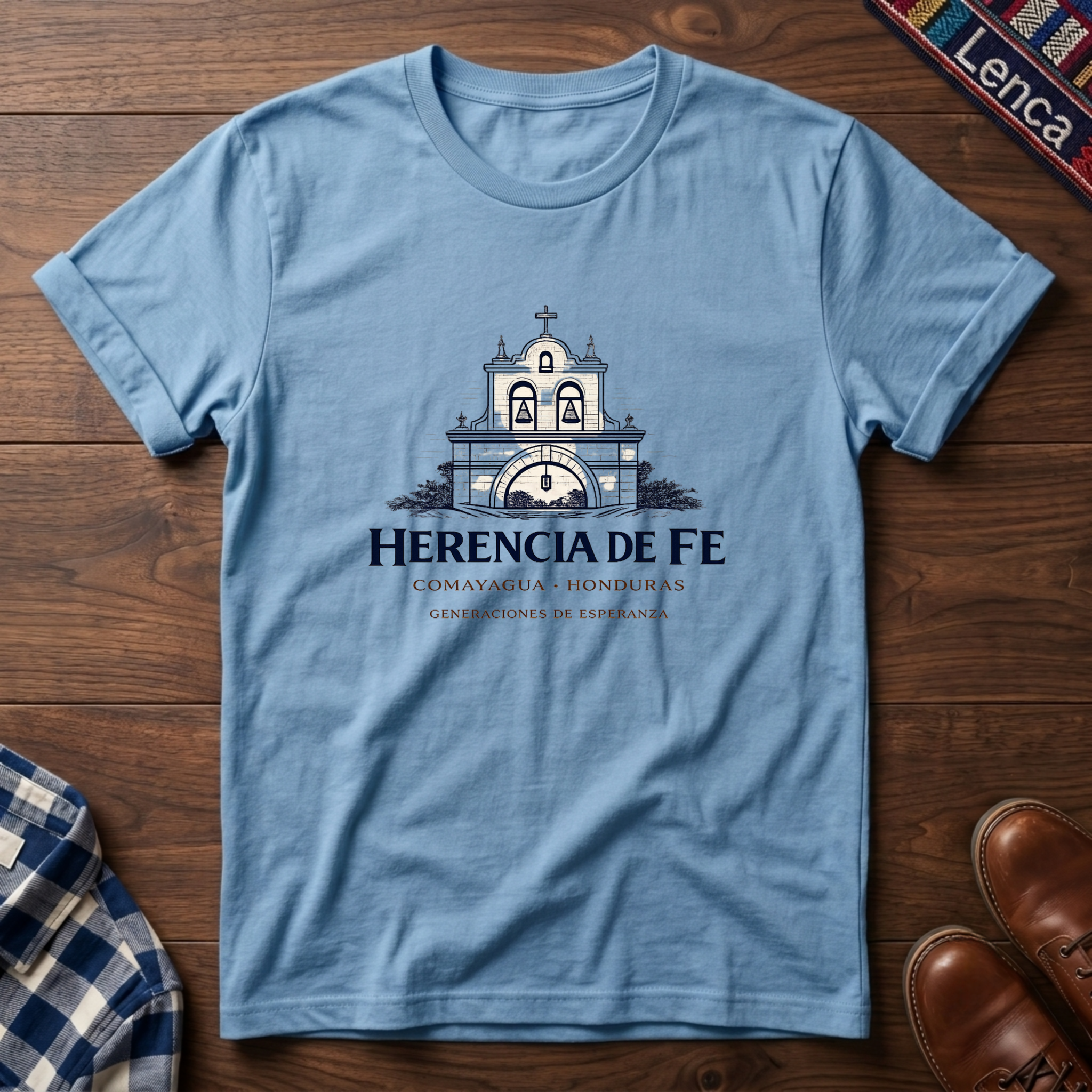 Light Blue t-shirt with a Honduras graphic design on a wooden surface.