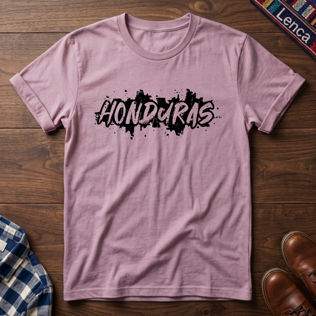 Light pink t-shirt with 'Honduras' print on a wooden surface