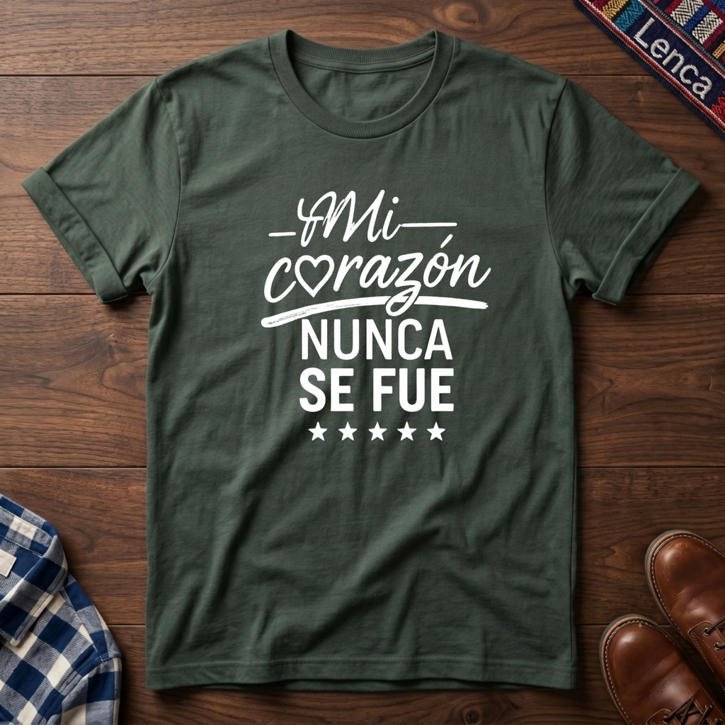 Military Green t-shirt with white 'Mi Corazon Nunca' text on a wooden surface.