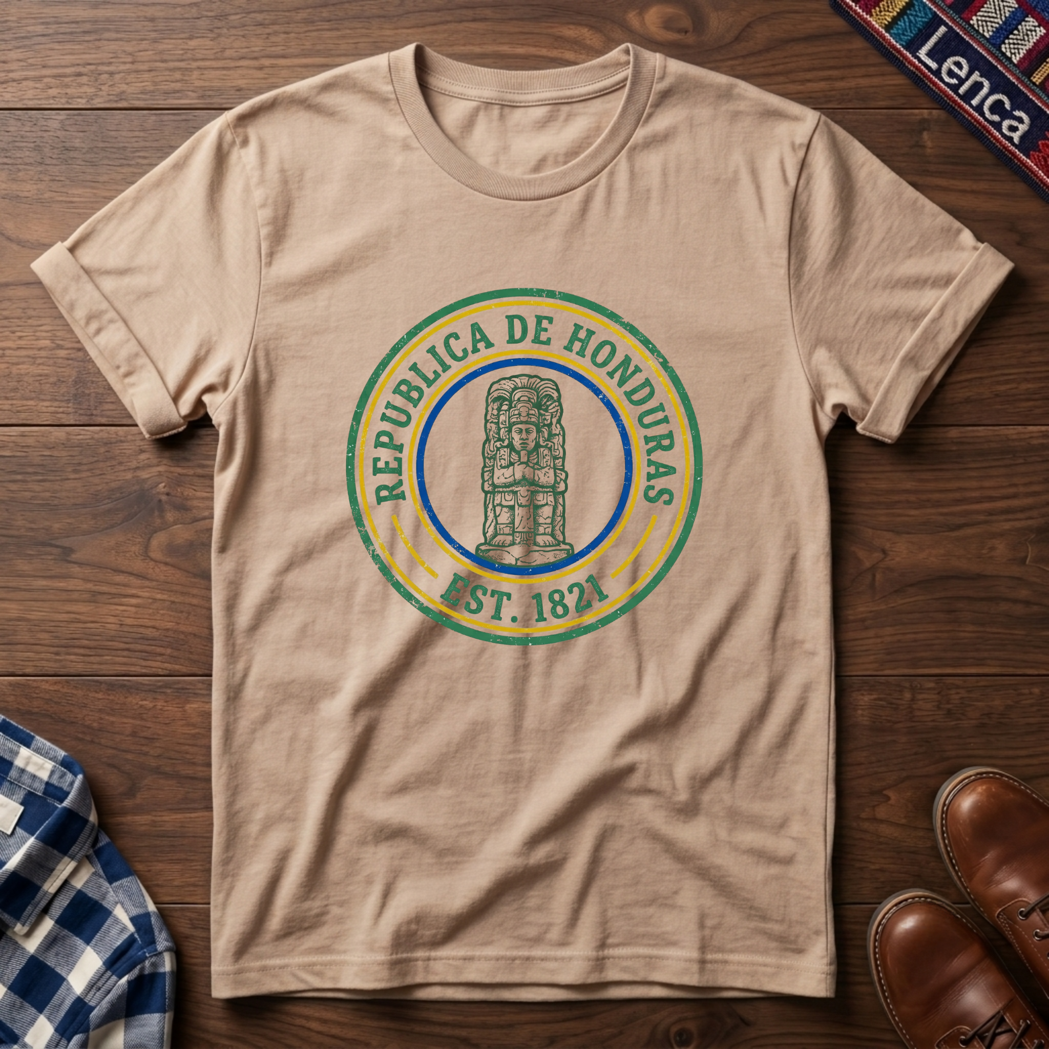 Natural t-shirt with 'Republica de Honduras' text graphic design on a wooden surface