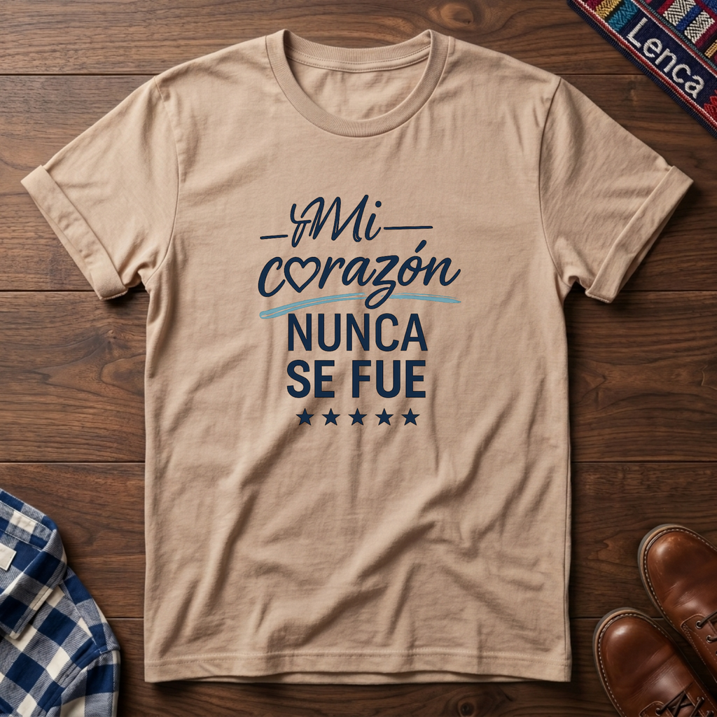Natural t-shirt with 'Mi Corazon Nunca' text on a wooden surface.