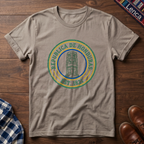 Sand t-shirt with 'Republica de Honduras' text graphic design on a wooden surface