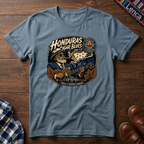 Blue t-shirt with 'Honduras Cigar Blues' graphic on a wooden surface.