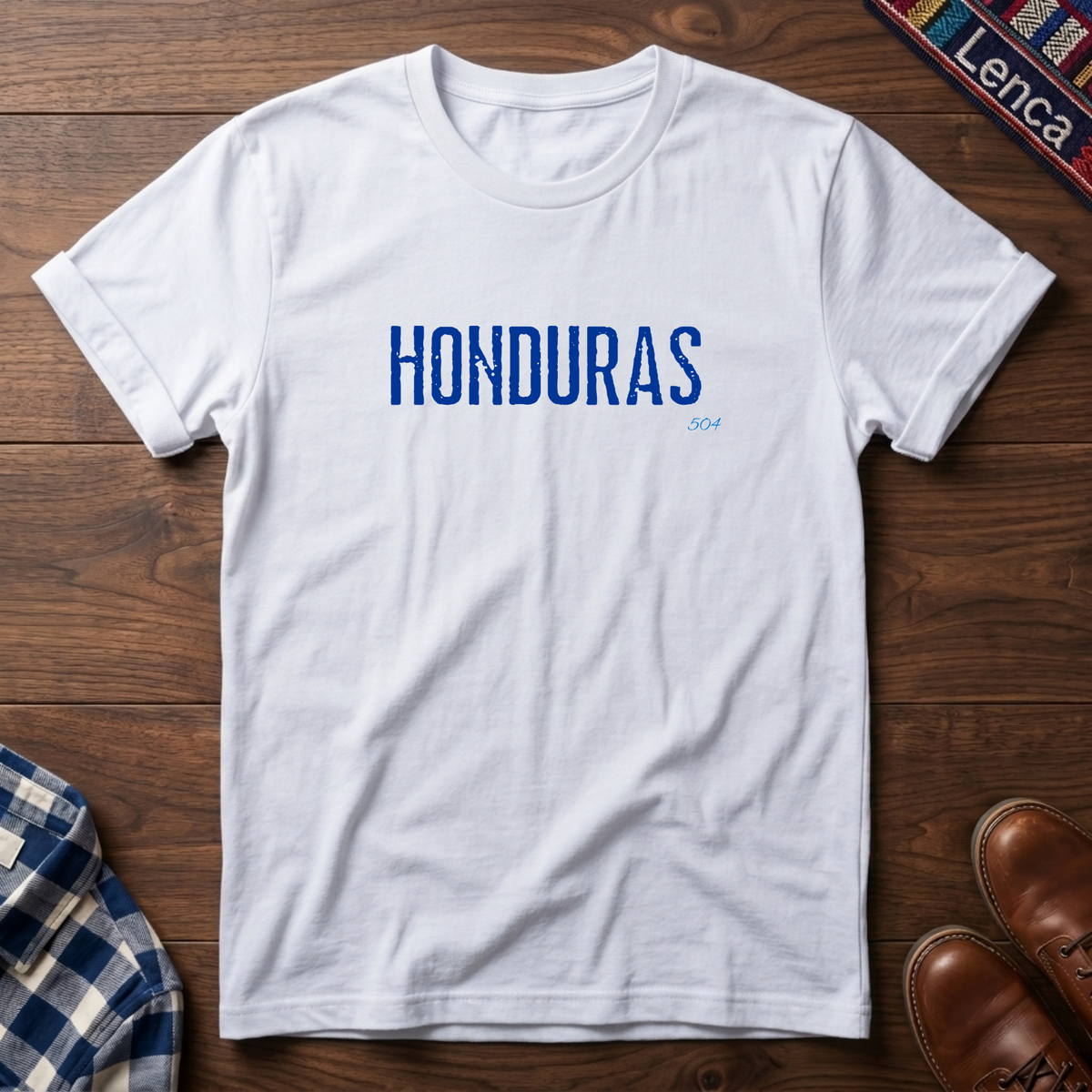 A white crewneck t-shirt with 'HONDURAS' printed in blue block letters across the chest.
